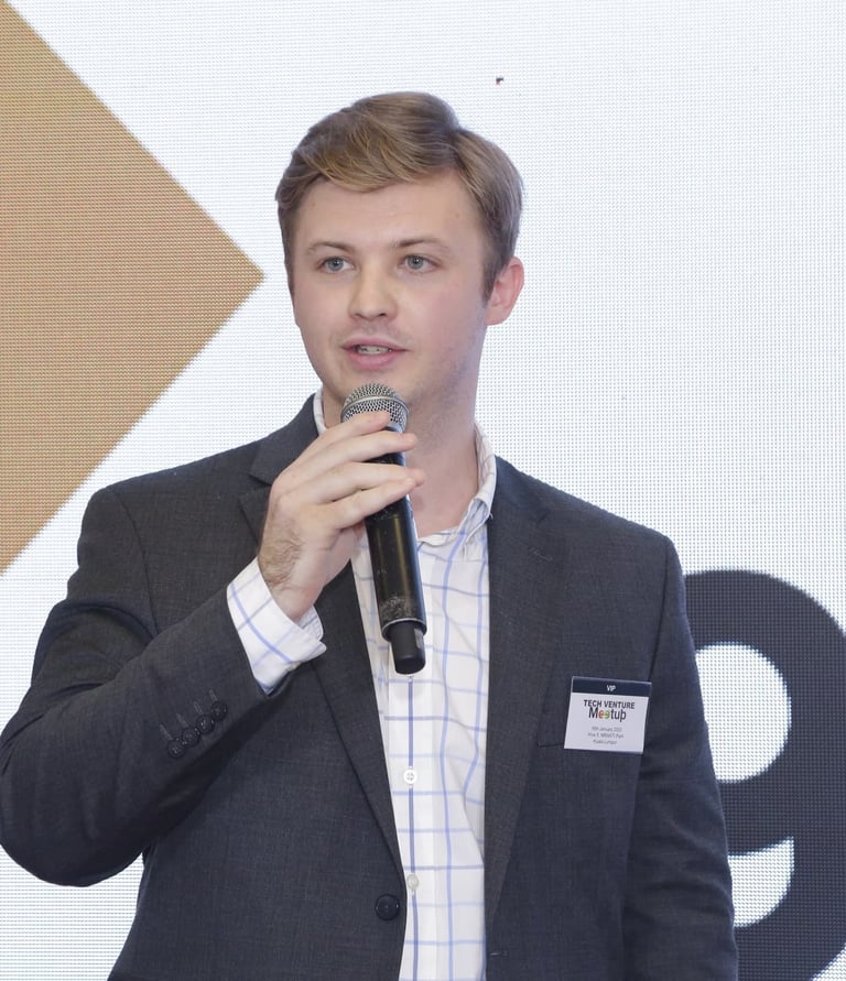 Hadrien Roy speaking at an event